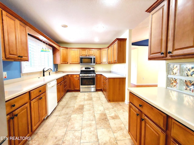 kitchen featuring stainless steel appliances and sink