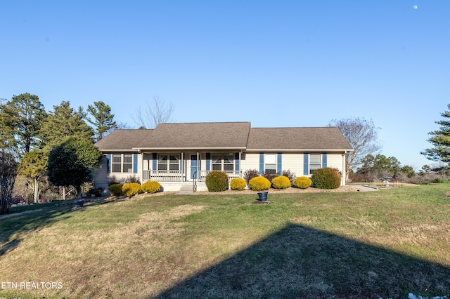 single story home with a front lawn and covered porch