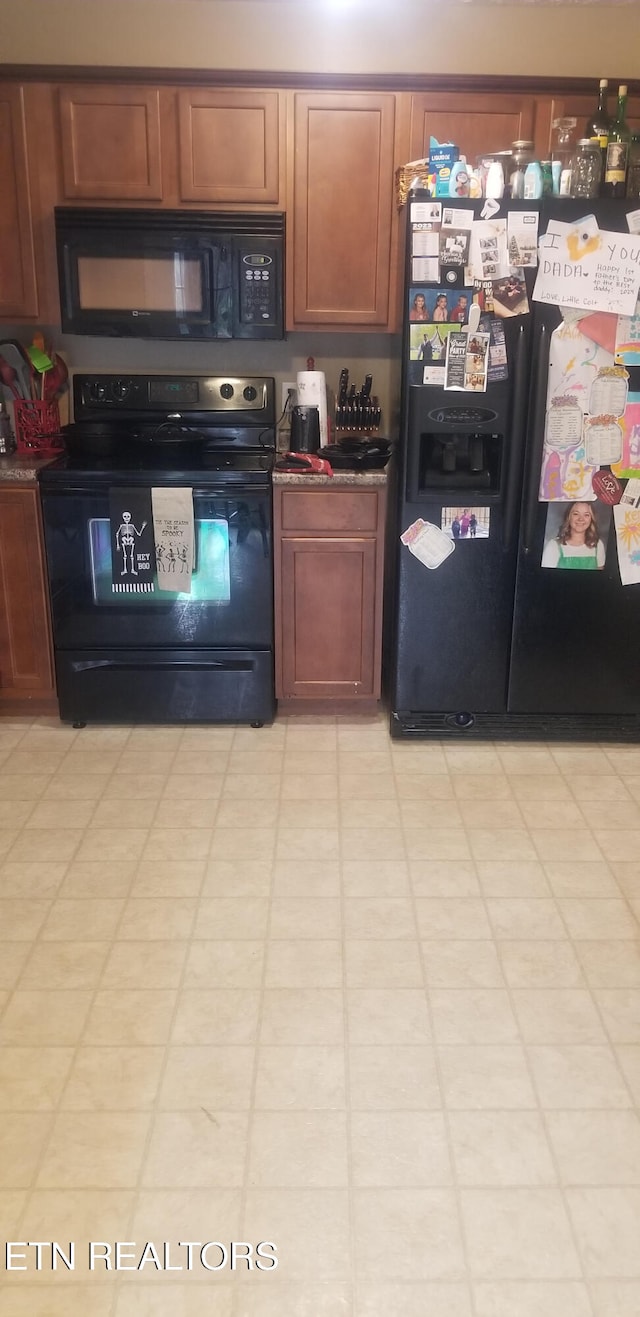 kitchen with black appliances