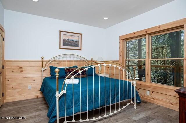 bedroom featuring wood-type flooring