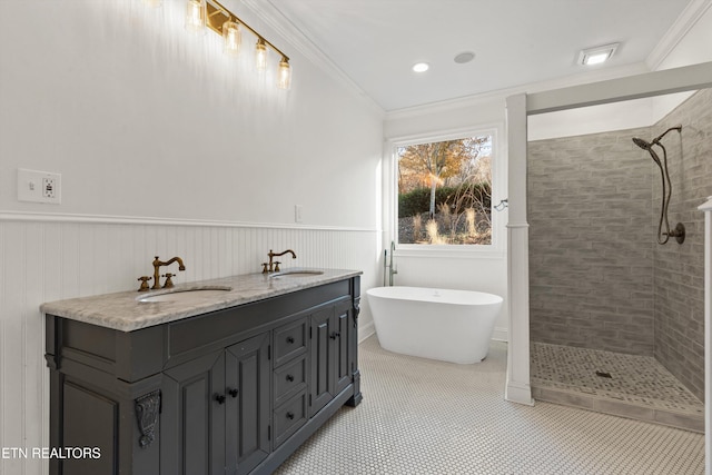 bathroom featuring tile patterned floors, vanity, independent shower and bath, and ornamental molding