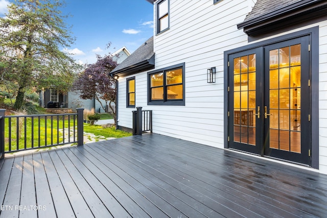 wooden terrace featuring french doors