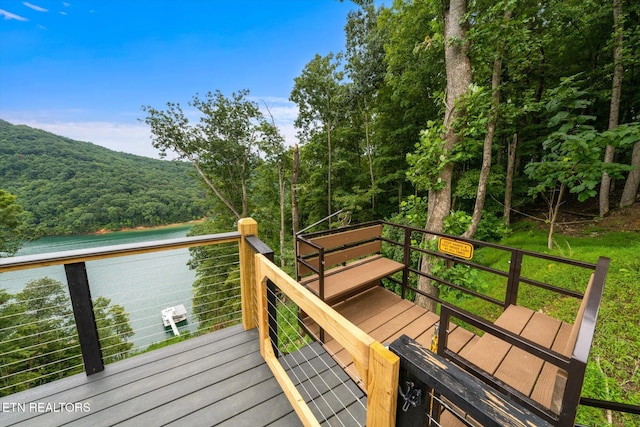 wooden deck featuring a mountain view