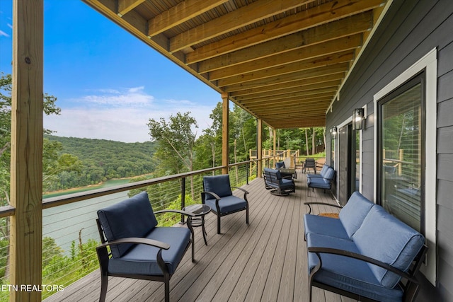 deck featuring outdoor lounge area