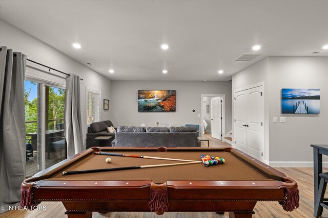 playroom with light wood-type flooring and billiards