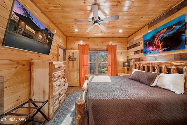 unfurnished bedroom featuring hardwood / wood-style flooring, wood walls, and wooden ceiling