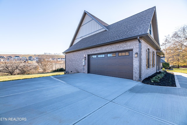 view of property exterior featuring a garage