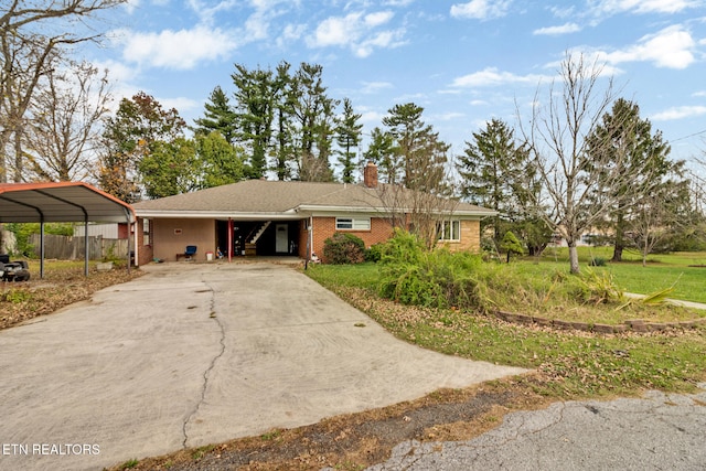 view of front facade with a carport