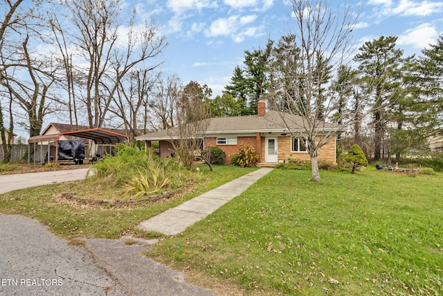 ranch-style house with a carport and a front lawn