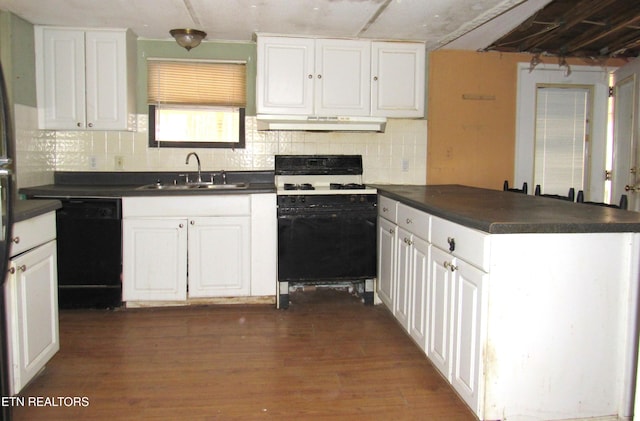 kitchen with dark hardwood / wood-style flooring, white cabinets, sink, dishwasher, and white range with gas stovetop