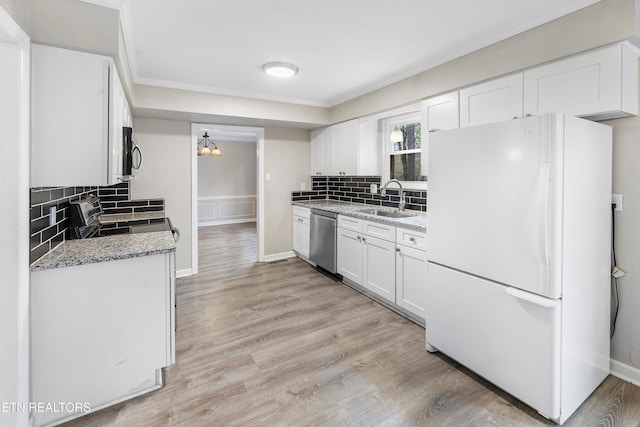 kitchen with white cabinetry, sink, stainless steel dishwasher, white fridge, and range