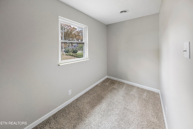 view of carpeted spare room