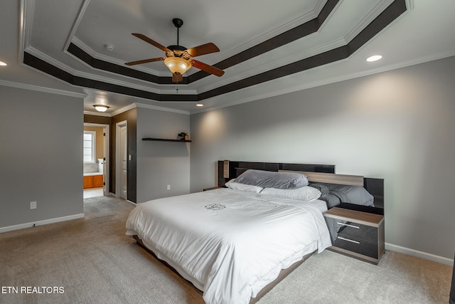 bedroom featuring ceiling fan, light carpet, a tray ceiling, and ornamental molding