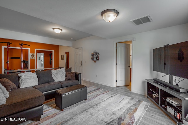 living room featuring light wood-type flooring