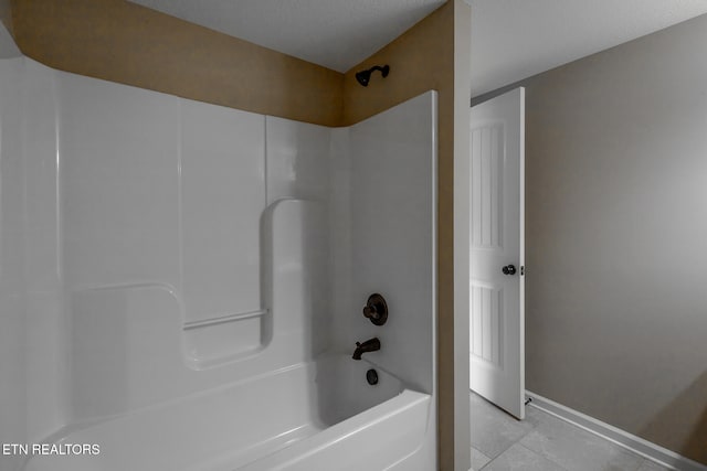 bathroom with shower / bathtub combination and tile patterned floors