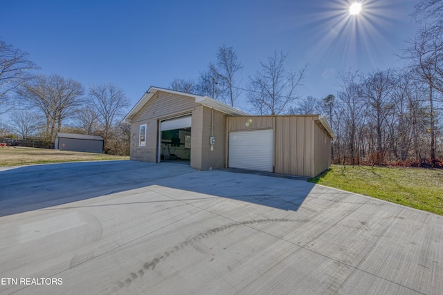 garage with a yard