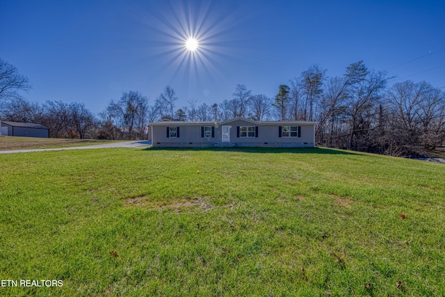 single story home with a front yard