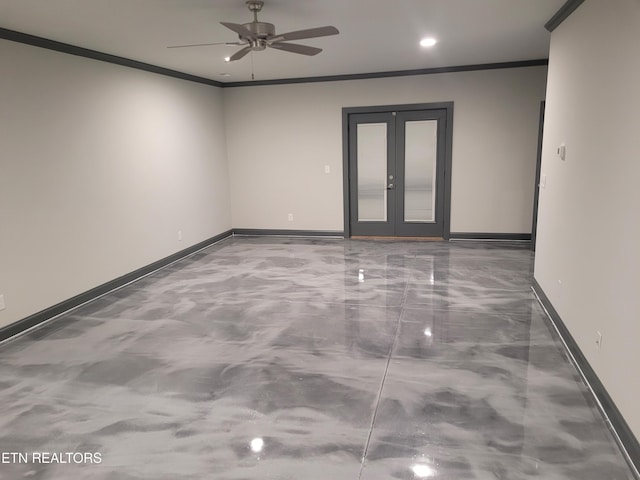 spare room with ceiling fan, french doors, concrete floors, and ornamental molding