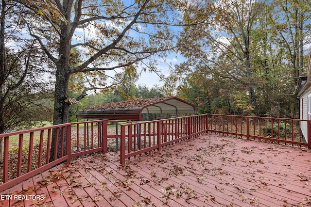 deck featuring a carport