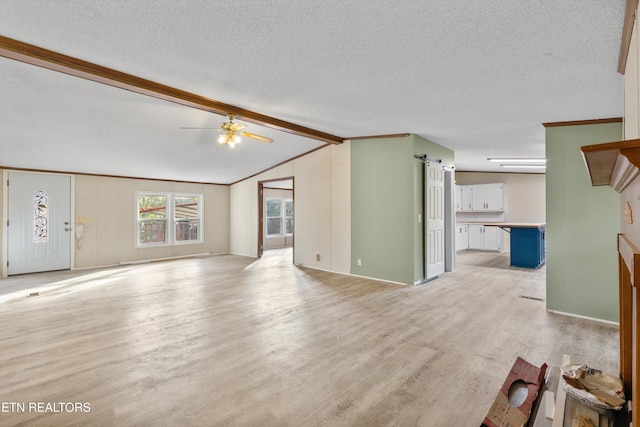 unfurnished living room with crown molding, light hardwood / wood-style flooring, vaulted ceiling with beams, ceiling fan, and a textured ceiling