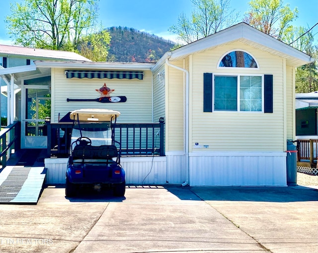 exterior space featuring a mountain view