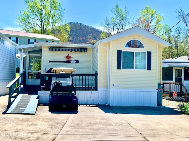 view of front of house with a mountain view