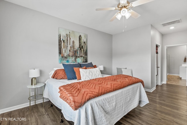 bedroom featuring ceiling fan and dark wood-type flooring