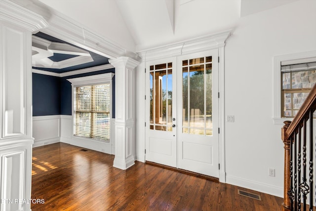 foyer entrance with plenty of natural light, dark wood-type flooring, and french doors