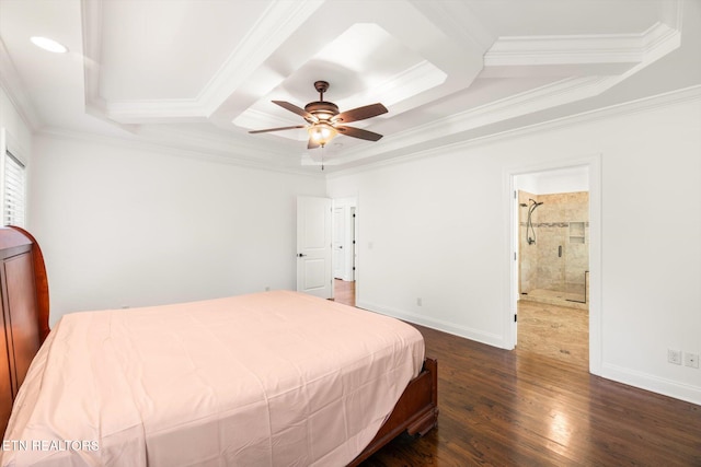 bedroom featuring ceiling fan, dark hardwood / wood-style flooring, crown molding, and ensuite bath