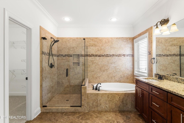 bathroom with vanity, separate shower and tub, and ornamental molding