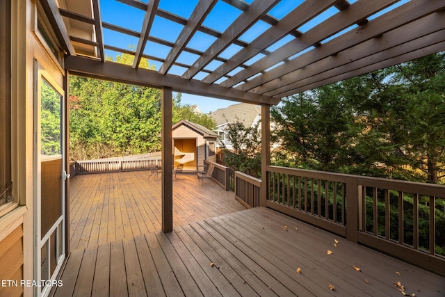 wooden terrace with a pergola