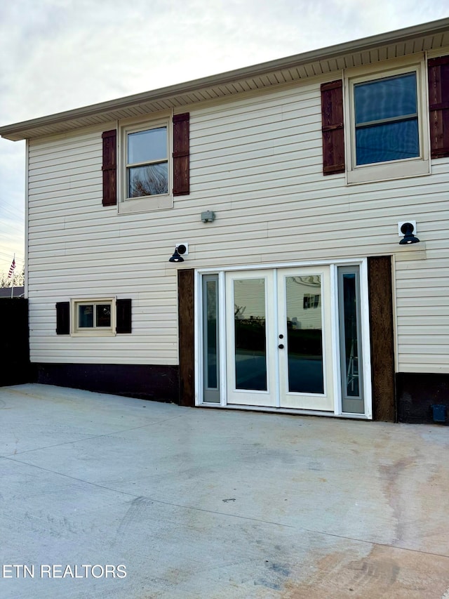 back of house with a patio area and french doors