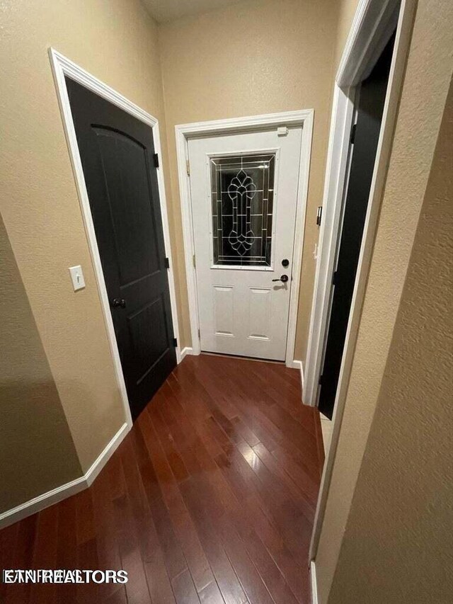 hall featuring dark hardwood / wood-style flooring