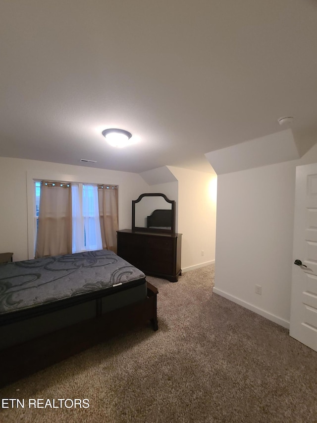 bedroom with visible vents, baseboards, and carpet floors