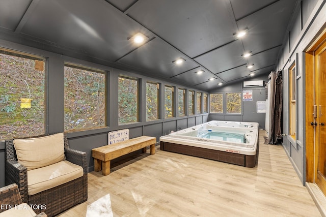 315 Caney Creek Rd, Pigeon Forge, TN 37863 - sunroom / solarium with a hot tub, a wall unit AC, and lofted ceiling