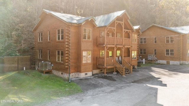 cabin featuring a balcony