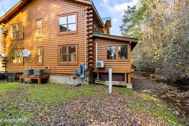 315 Caney Creek Rd, Pigeon Forge, TN 37863 - back of property featuring log siding, a cooling unit, and central AC unit