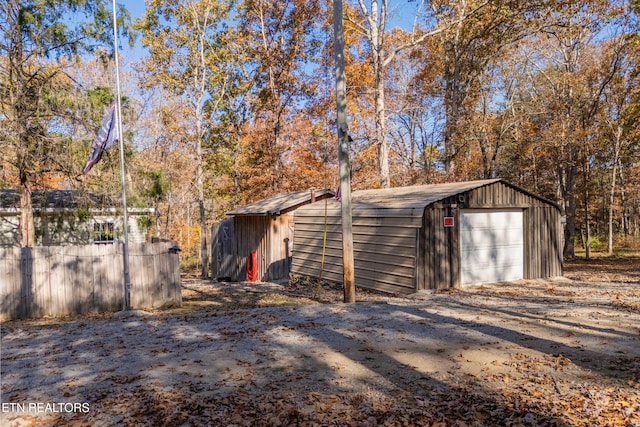 view of outbuilding featuring a garage