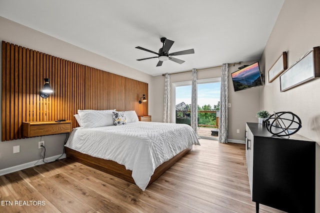 bedroom with access to outside, ceiling fan, and light hardwood / wood-style flooring