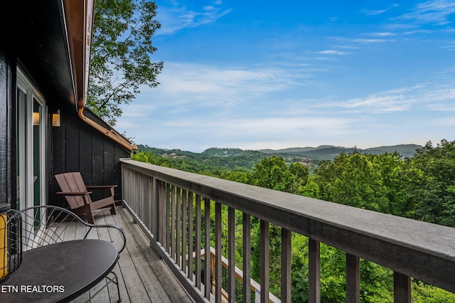 deck featuring a mountain view