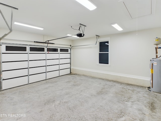 garage featuring a garage door opener, gas water heater, and baseboards