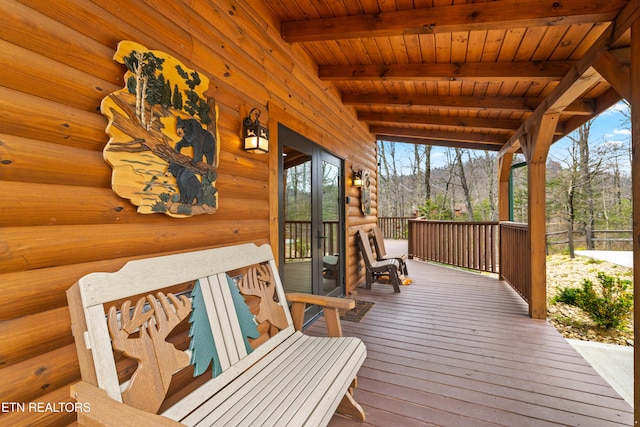 wooden deck featuring covered porch