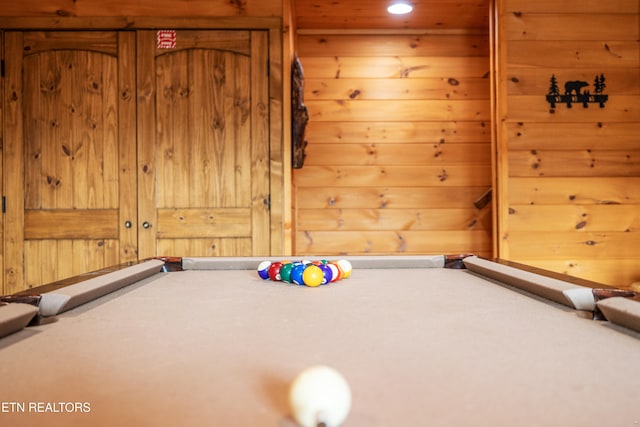 playroom featuring pool table and wooden walls