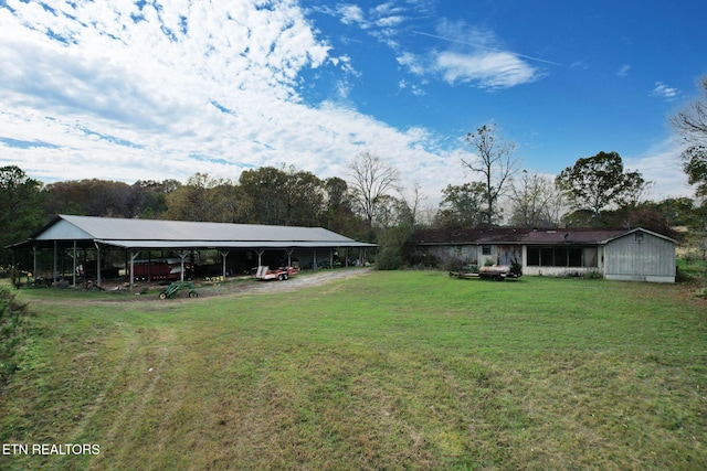 view of yard with a carport