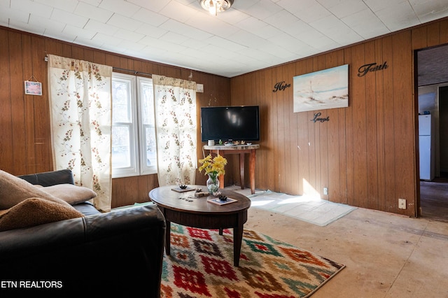 living room featuring wooden walls