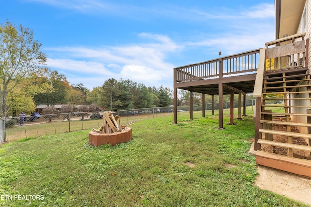 view of yard featuring a wooden deck