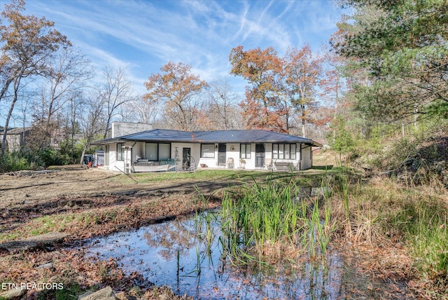 rear view of house featuring a patio area