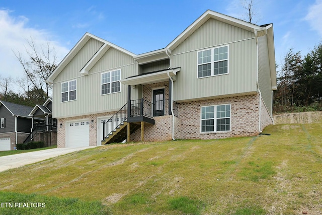 split foyer home with a garage and a front lawn