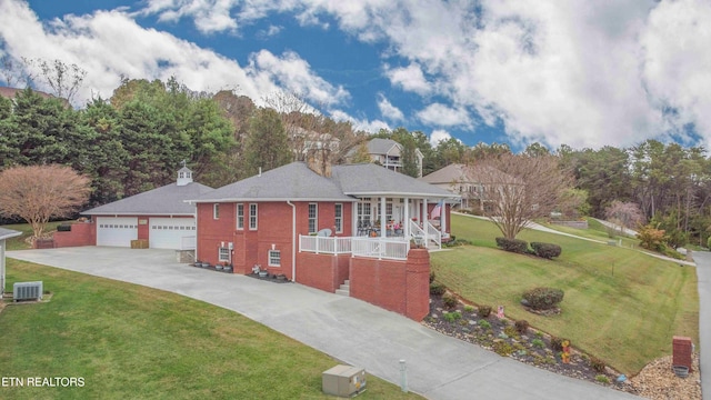 view of front of property featuring covered porch, a front lawn, cooling unit, and brick siding