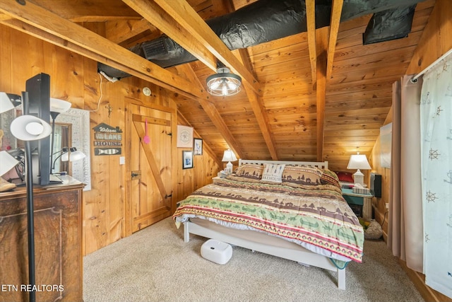 carpeted bedroom with vaulted ceiling with beams, wooden ceiling, and wooden walls